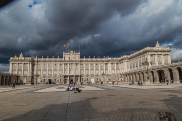 Fototapeta na wymiar MADRID, SPAIN - OCTOBER 22, 2017: People in front of Palacio Real (Royal Palace) in Madrid.