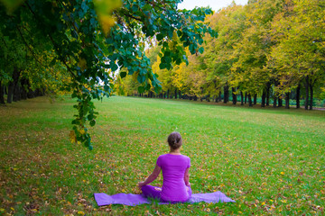 woman doing yoga outdoors