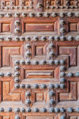 Old door of Jesuit Church (San Ildefonso) in Toledo, Spain