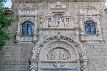 Decoration of the portal of the medieval hospital Santa Cruz in Toledo, Spain