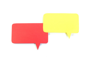 Red and yellow speech bubble on white background