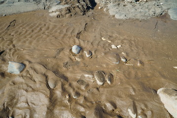 Mud overflowing from flood damage