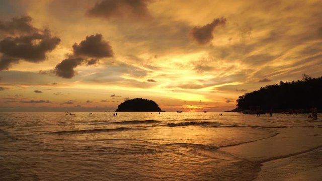 stunning sunset in channel between islands. Koh Pu or crab island is in the middle between Kata beach and Karon beach