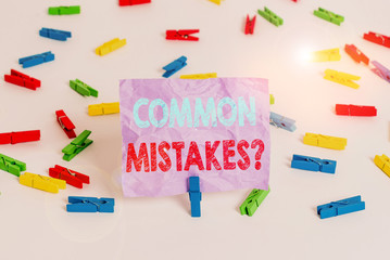 Writing note showing Common Mistakes Question. Business concept for repeat act or judgement...