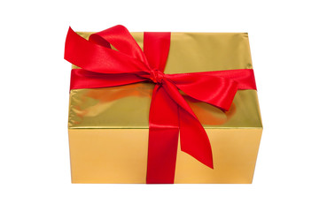 Goldenes Weihnachtsgeschenk mit roter Schleife als Freisteller