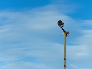 Old urban sound warning system. Street pole with two loudspeaker