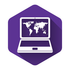 White Laptop with world map on screen icon isolated with long shadow. World map geography symbol. Purple hexagon button. Vector Illustration