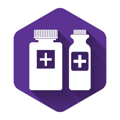 White Medicine bottle icon isolated with long shadow. Bottle pill sign. Pharmacy design. Purple hexagon button. Vector Illustration