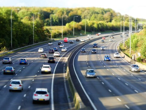 Tilt shift photograph of the M25 London Orbital Motorway near Junction 17 in Hertfordshire, UK