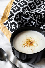 Cauliflower Soup (Creme du Barry) in black bowl