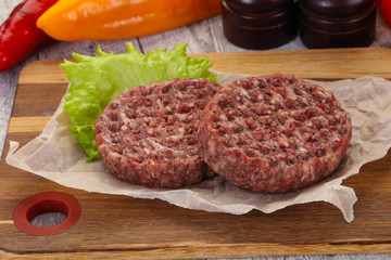 Raw burger cutlet