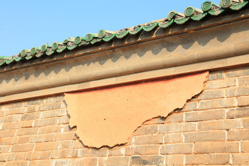 Broken glazed tile walls
