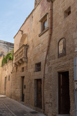 Fototapeta na wymiar Martano, Messapian city. Salento, Puglia Italy, view of alleys and buildings. September morning.