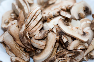 chopped mushrooms on a chopping board