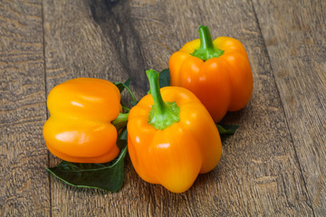 Yellow Bell pepper with leaves