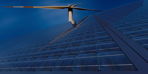 clean energy concept, photovoltaic panels and wind turbines in the night