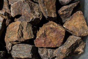 Bronzite gemstone as natural mineral rock