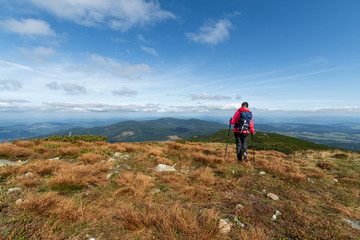 girl athlete on top of the mountain.