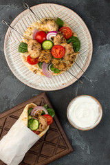 Souvlaki with vegetables wrapped in pita