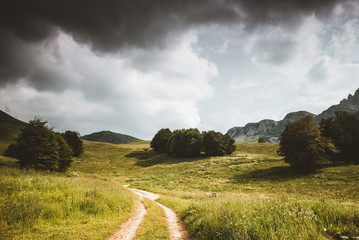 landscape with road and clouds