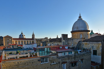 Fototapeta na wymiar Naples, Italy, 12/10/2019. Domes of churches on the terraces and on the roofs in the historic city center