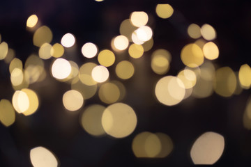 Christmas light background. Holiday glowing backdrop. Defocused background, blurred bokeh. Background or texture for your design