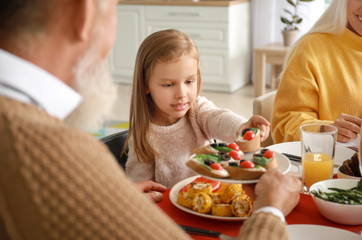 Big family having dinner at home