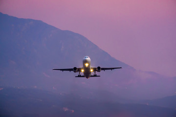 Sunset view of Airport of Tivat, Montenegro, with take-off planes.