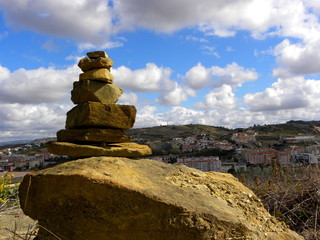 Fototapeta na wymiar cairn on top of a mountain