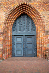 Fototapeta na wymiar the old church door of St. Peter's Church in Wolgast