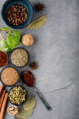 Wooden table of colorful spices. Top view