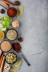 Wooden table of colorful spices. Top view