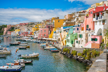 Colorful harbour in the beautiful island of Procida, near Napoli, Campania region, Italy.  - obrazy, fototapety, plakaty