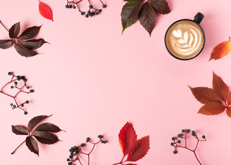 Fall and autumn flat lay with coffee and  leaves creative frame