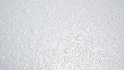 White water drops or pearls on a clean desinfection surface background