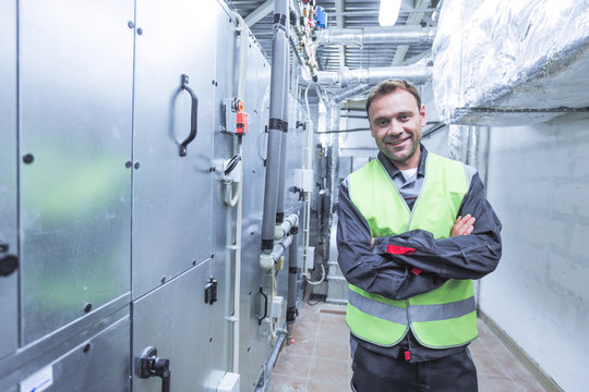 Worker In Electrical Switchgear Room