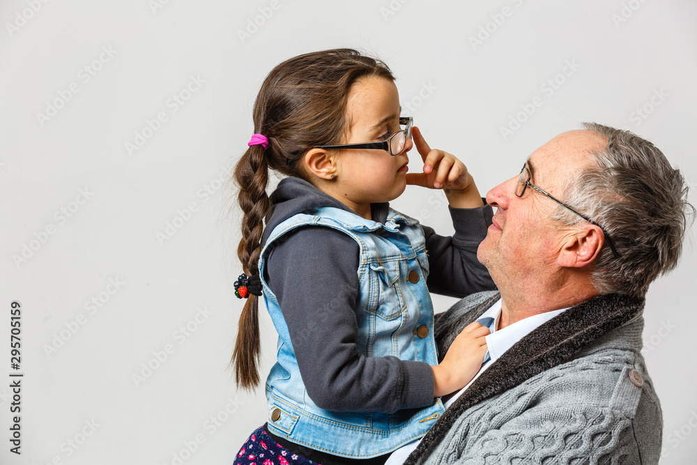 Canvas Prints grandfather and granddaughter with glasses at home