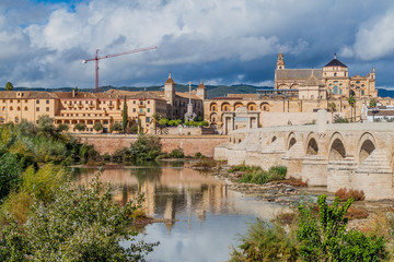 Fototapeta na wymiar Mosque-Cathedral and Roman Bridge in Cordoba, Spain