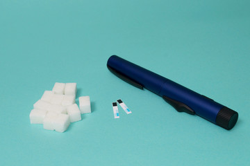 glucose meter and syringe insulin, diabetes concept