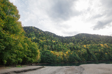 Lake Ritsa Abkhazia mountains water nature autumn trees
