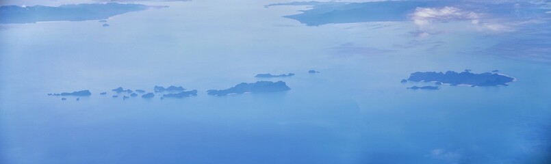 Phuket Thailand aerial drone bird's eye view photo of tropical sea, Indian Ocean, coast with Beautiful island south of Bangkok in the  Andaman Sea, near the Strait of Malacca. Asia. 