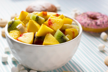 Fruit salad, donut and sweets