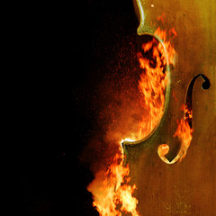 Burning cello, dark atmospheric mood, music instrument fantasy background