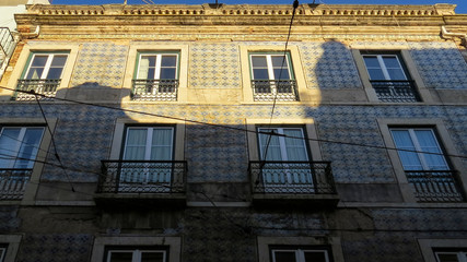  Typical facade of a building with tiles (azuleios)  wall  of Lisbon, Portugal