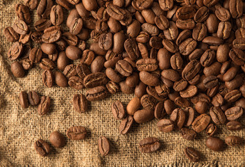 coffee beans on burlap background