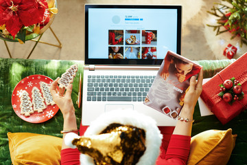 female with planning dinner and looking for recipes online