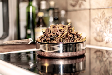 Autumn chantarelles prepared for fridge by removing moist before freezing