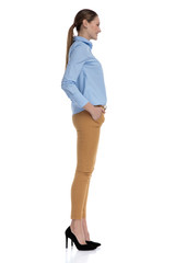 Fototapeta premium happy young businesswoman wearing blue shirt and smiling