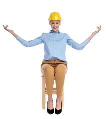 happy young woman wearing safety helmet