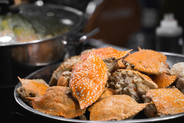 Crab is cooked on the Asian night market. Sea food.